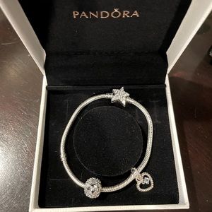 Pandora star clasp bracelet with 2 charms. Beautiful! Like new. Never ever worn!